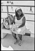 https://www.ed-templeton.com/files/gimgs/th-153_Homeless girl Hungry sign HB pier V2.jpg